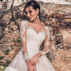 Gorgeous Long Sleeve Ball Gown Wedding Dress with Illusion Back